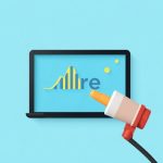 A marketers behind a computer grades her business
