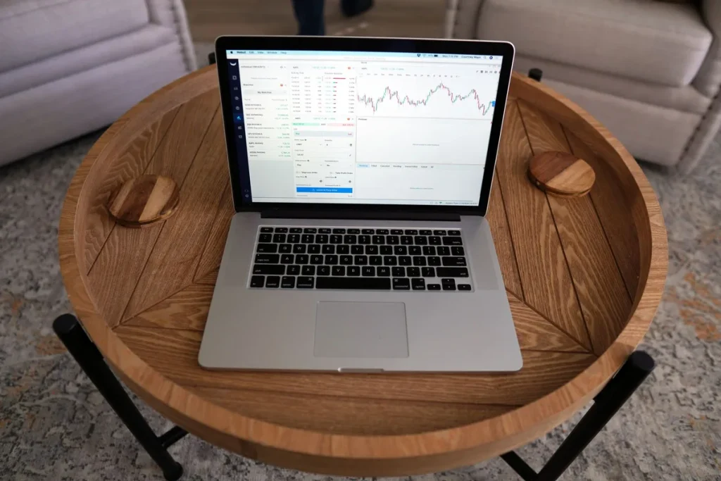 Professional reviewing SEO analytics and metrics on a computer screen in an office environment
