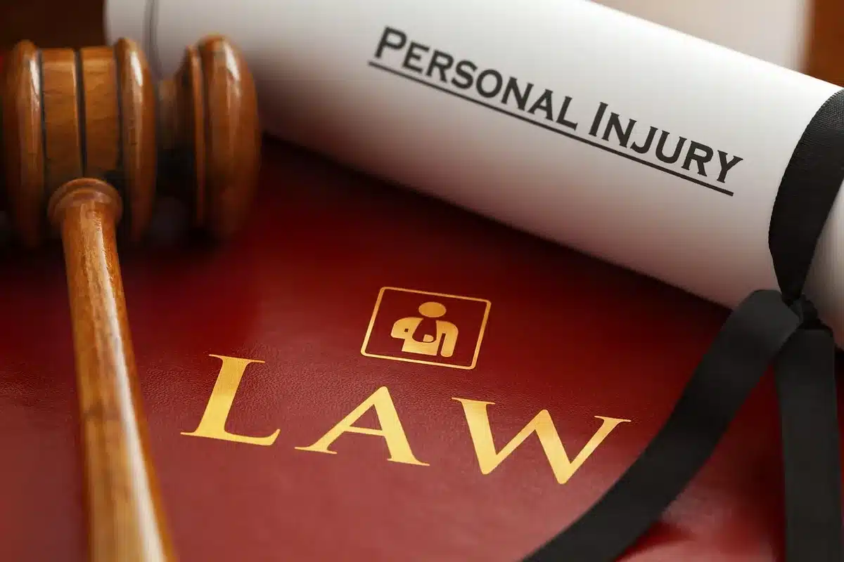 Stack of legal documents and a gavel representing administrative and criminal proceedings