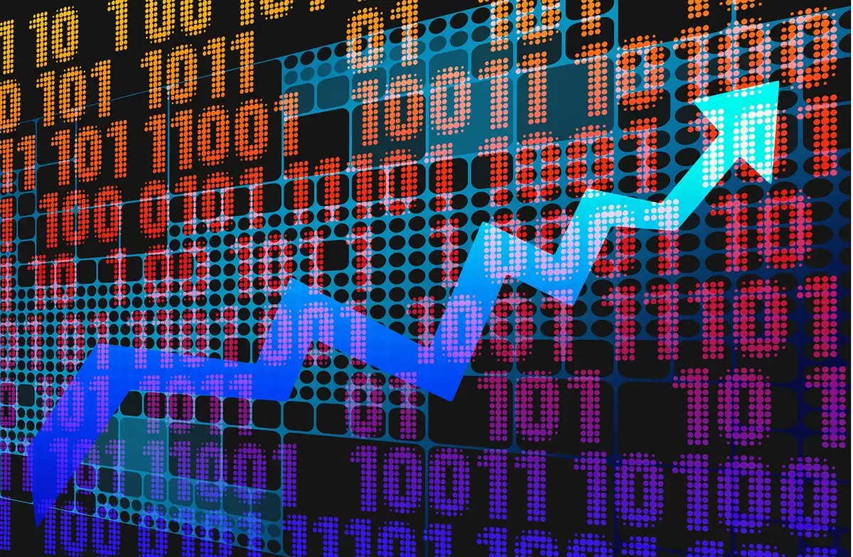 Traders on a stock exchange floor in front of screens showing rising indices