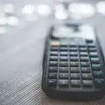 Desk with budget papers and calculator symbolizing fiscal policy challenges