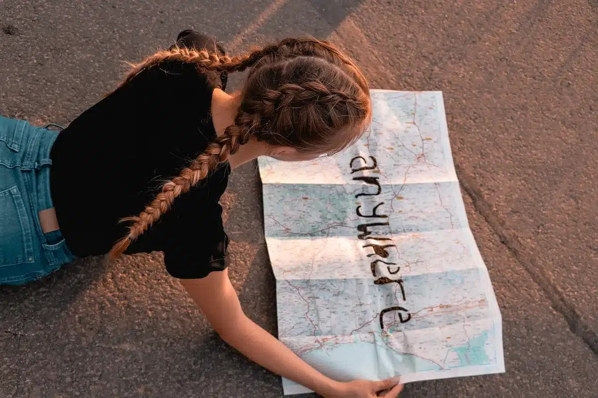 Anonymous meeting around a map discussing island economic plans