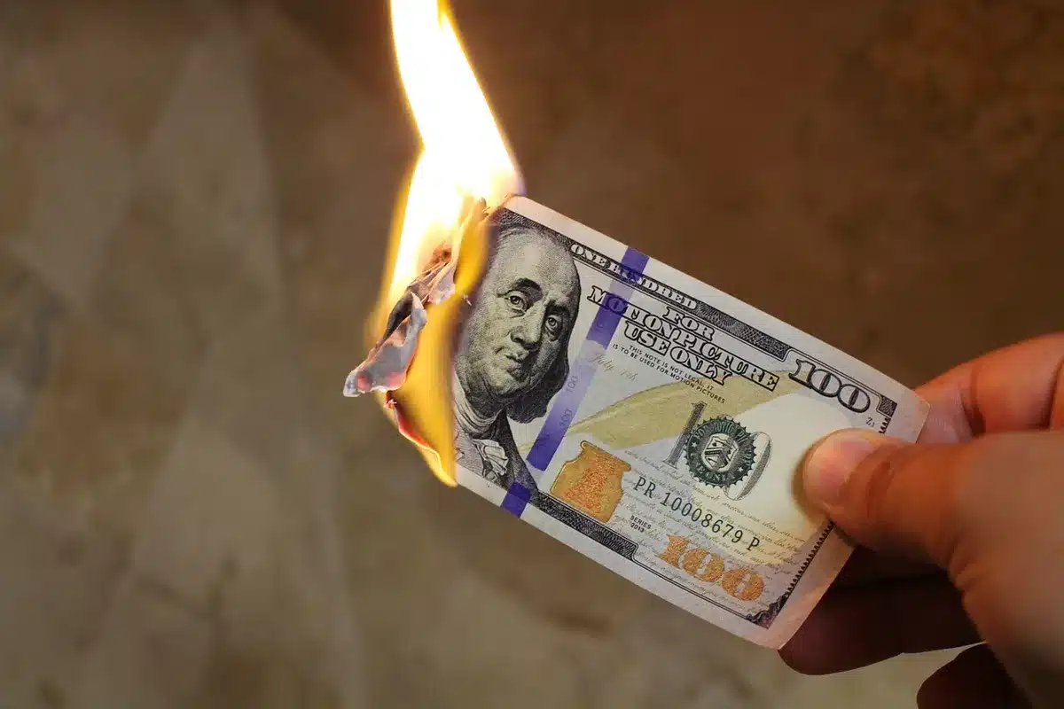 Argentine peso notes and a market scene illustrating inflation pressure