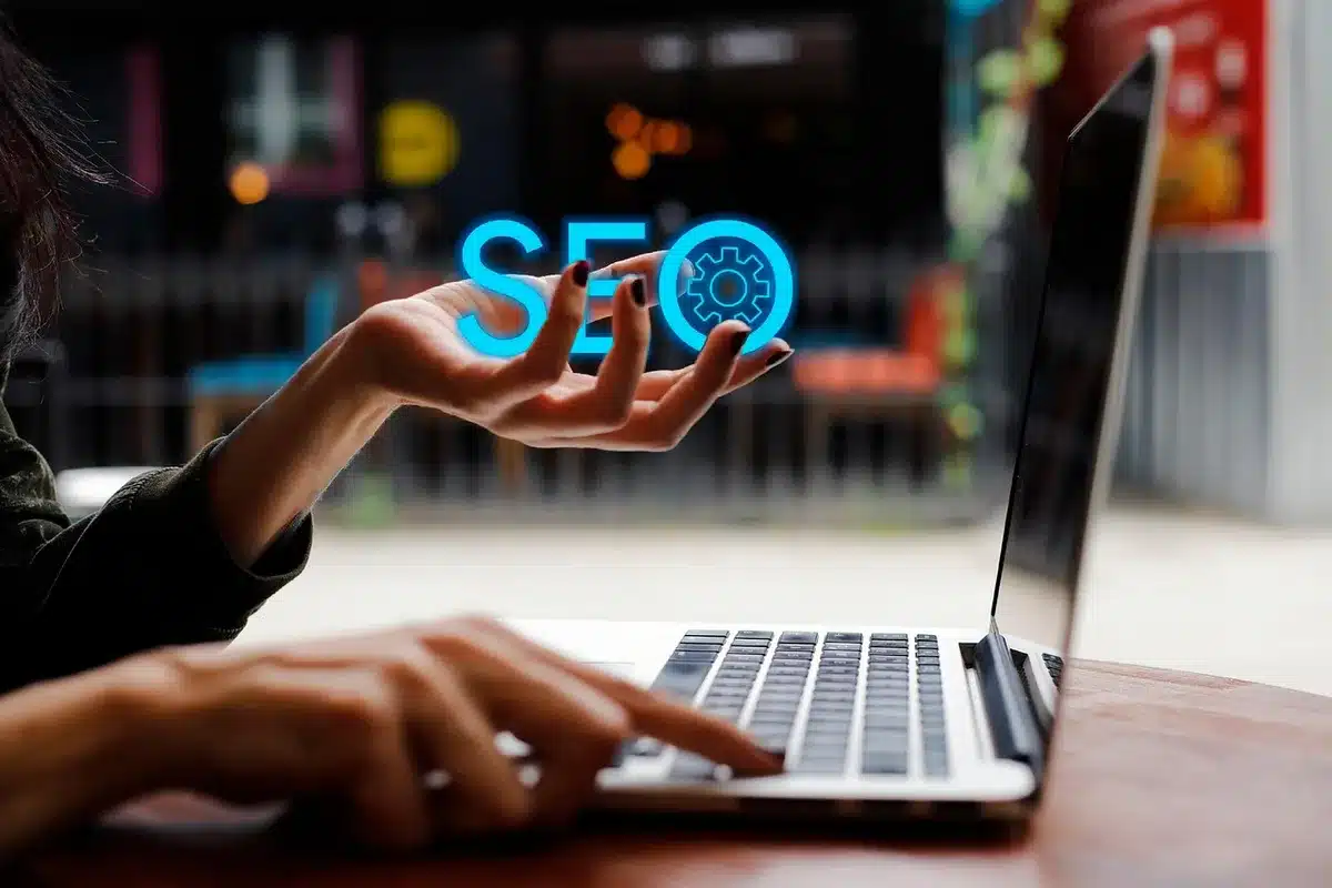 A laptop screen showing comparison charts of SEO metrics